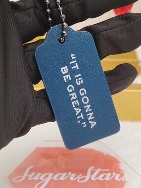 Coach tag bag charm
